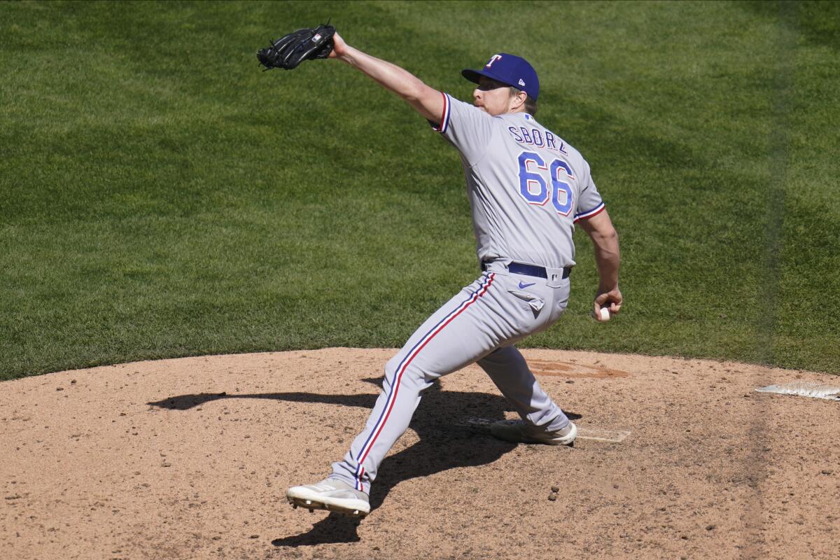 Heim hits walk-off HR again, Rangers rally past Mariners 4-3