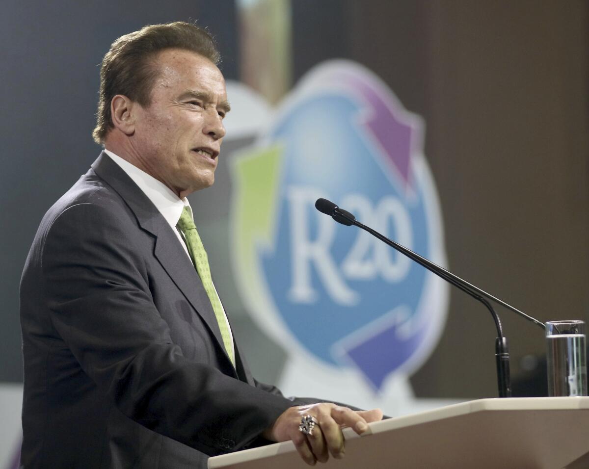 Former California Gov. Arnold Schwarzenegger delivers a speech during the R20 Austrian world summit in Vienna on May 15.