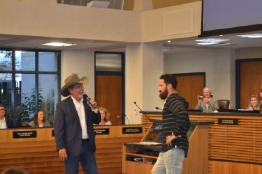 Poway Mayor Steve Vaus talks about resident and Super Bowl winner Eric Weddle during the Poway City Council meeting on Tuesday night.
