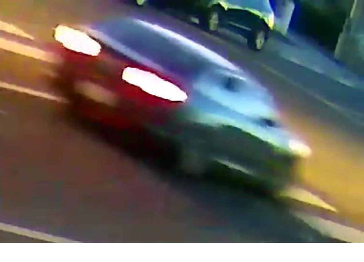 Surveillance image of car in street