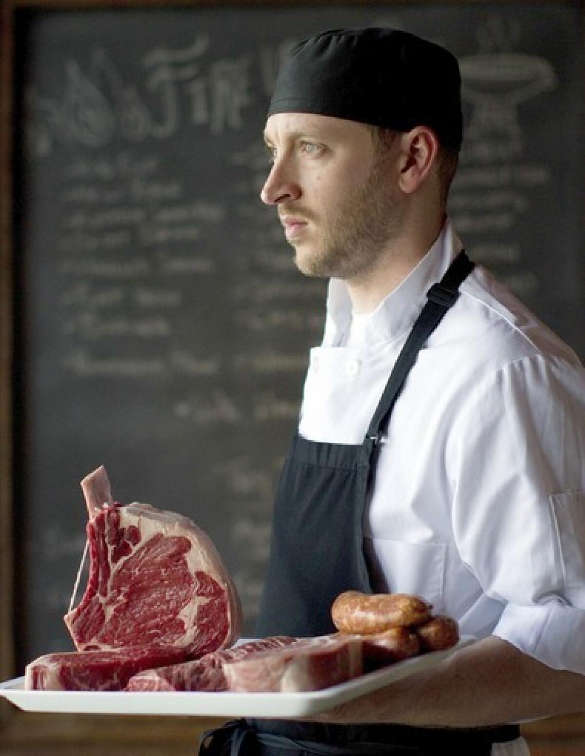 Nathan McCall shows off a variety of fresh meats at his McCall's Meat & Fish Co. in Los Feliz.