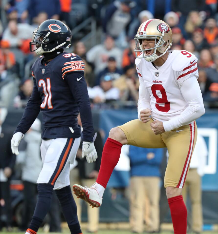 49ers kicker Robbie Gould (9) faces Bears coaches to celebrate after kicking the game-winning field goal to beat the Bears 15-14 at Soldier Field, Sunday, Dec. 3, 2017. Gould scored all 15 points on five field goals.