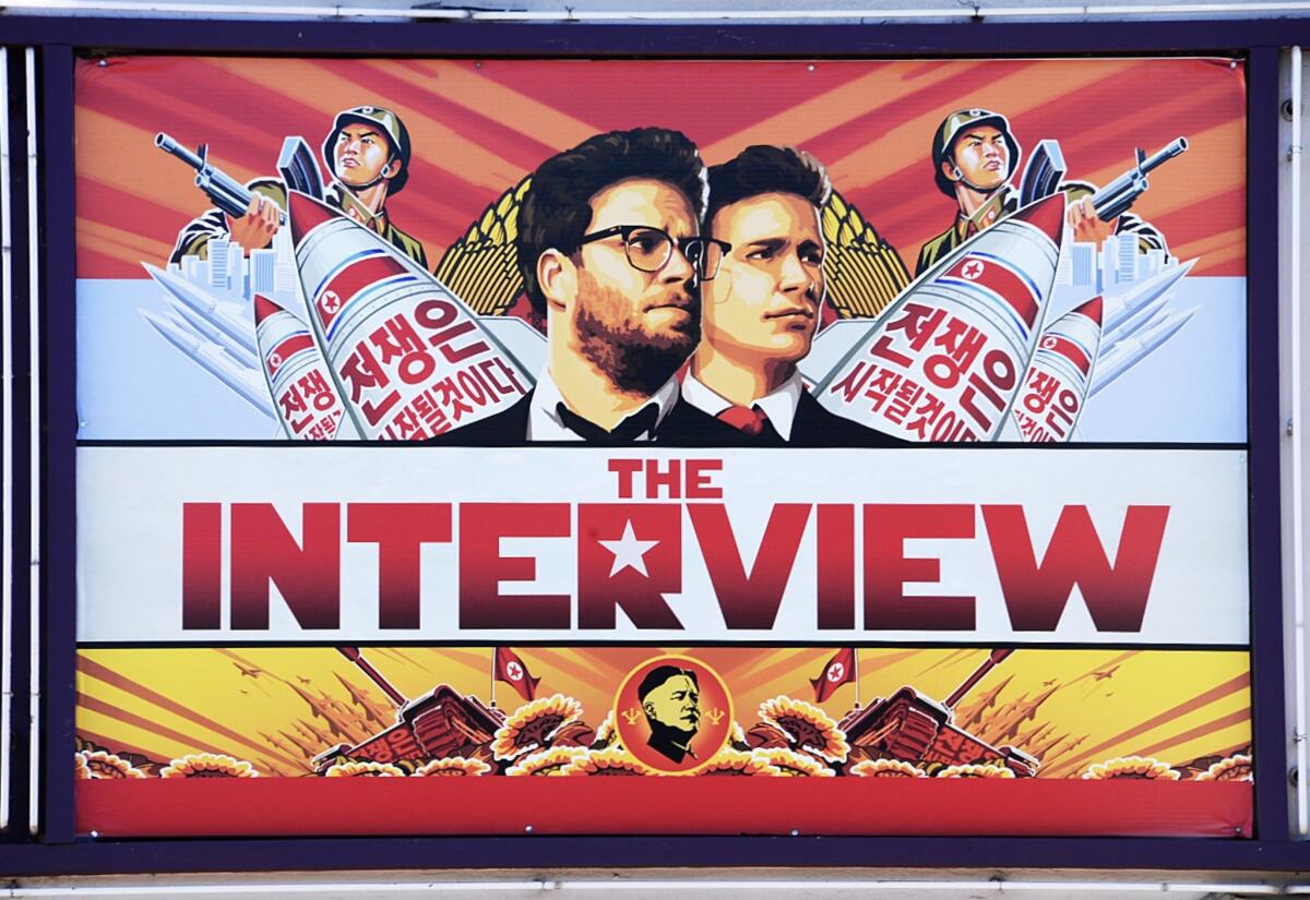 A poster for "The Interview" is displayed on the marquee of the Los Feliz 3 cinema in Los Angeles on Dec. 25.