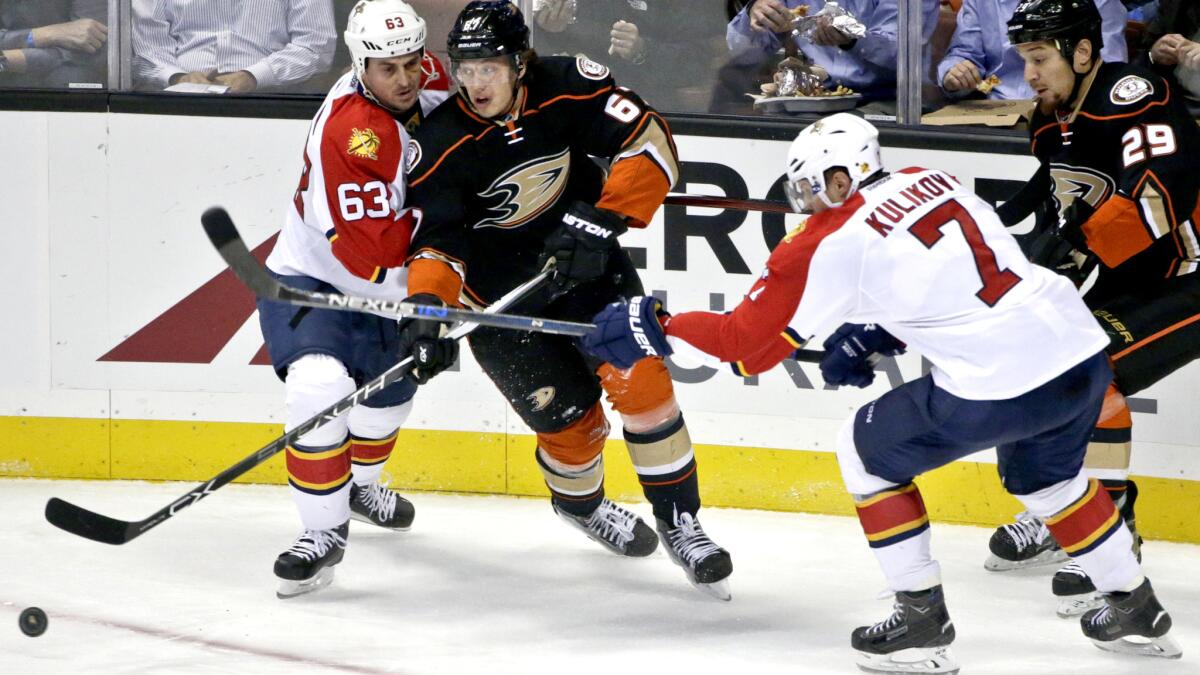 Ducks center Rickard Rakell tries to bring the puck out of the corner against the Panthers in the first period Wednesday night.