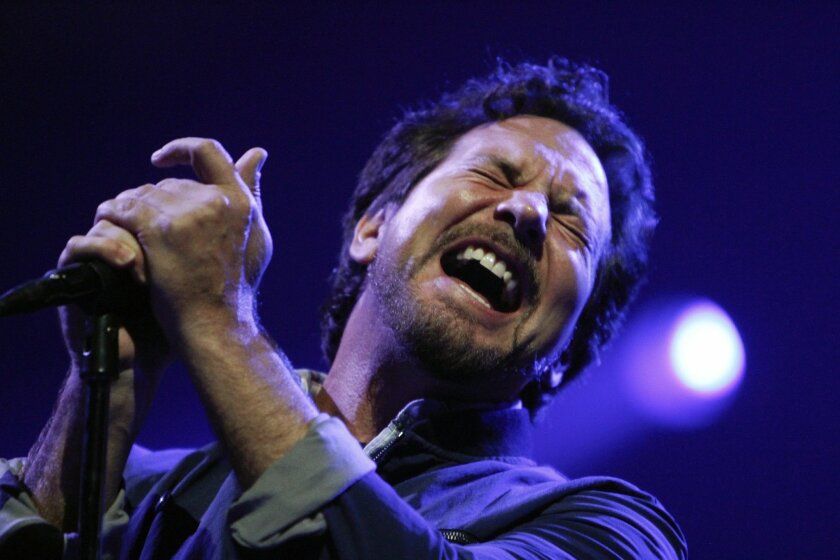 Lead singer Eddie Vedder and Pearl Jam perform at Viejas Arena at San Diego State in San Diego on Thursday, November 21, 2013.
