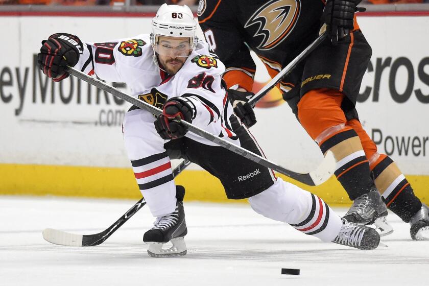 Chicago Blackhawks center Antoine Vermette passes the puck during the second period of the Ducks' win in Game 1 of the Western Conference finals at Honda Center.