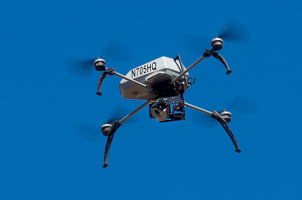 A drone flies during a demonstration of a search and rescue operation on Friday, Aug. 14, 2015, in Dublin, Calif.