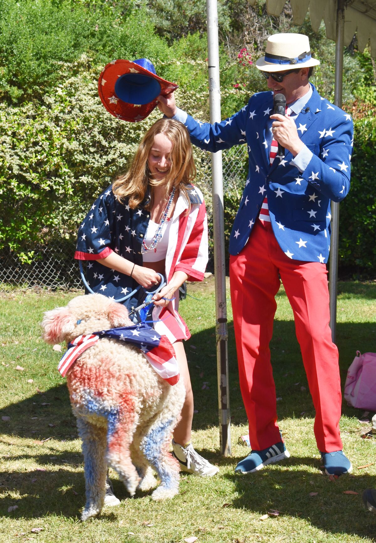 Brianne Zevely and her father, Jeff Zevely, entertained the audience with a comedic bit about their dog, Raleigh.