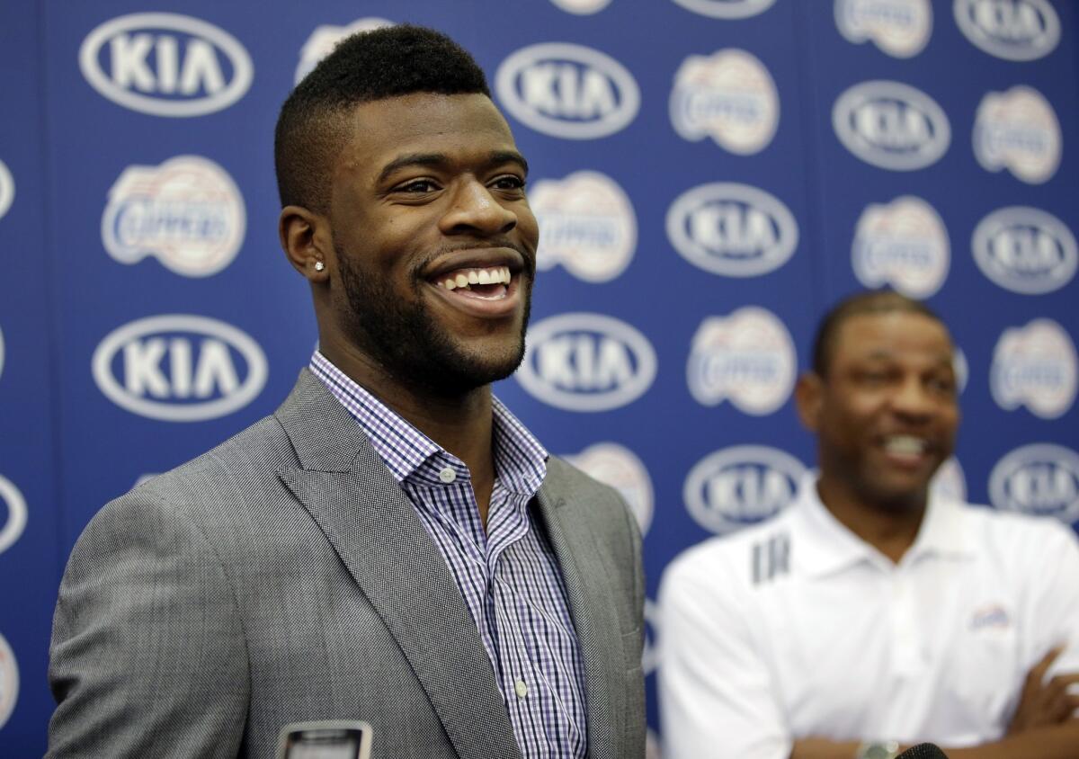 First-round draft pick Reggie Bullock practiced with the Clippers on Monday for the first time during training camp.