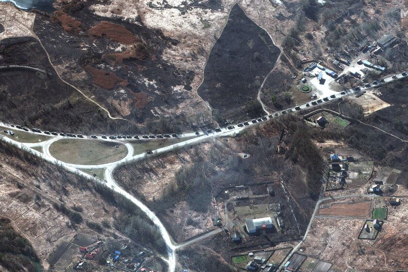 This satellite image provided by Maxar Technologies shows a military convoy near Invankiv, Ukraine Monday, Feb. 28, 2022. (Satellite image ©2022 Maxar Technologies via AP)