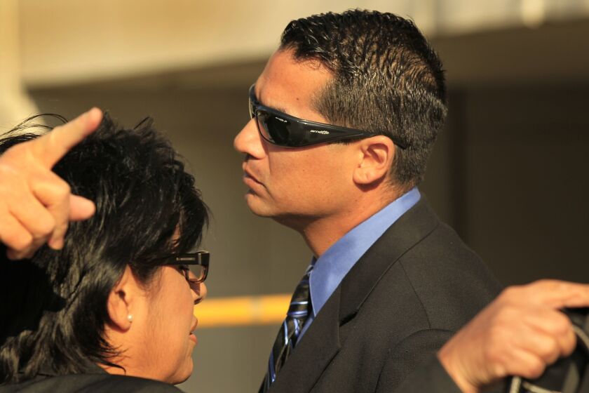 Former Los Angeles County Sheriff's Deputy Gilbert Michel enters court Tuesday in Los Angeles.