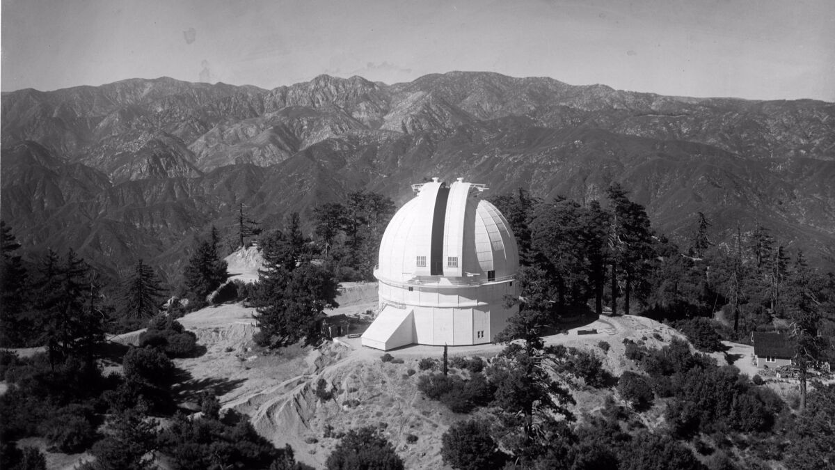 The completed 100-inch telescope dome at Mt. Wilson Observatory, as seen from the 150-foot tower telescope in 1916.