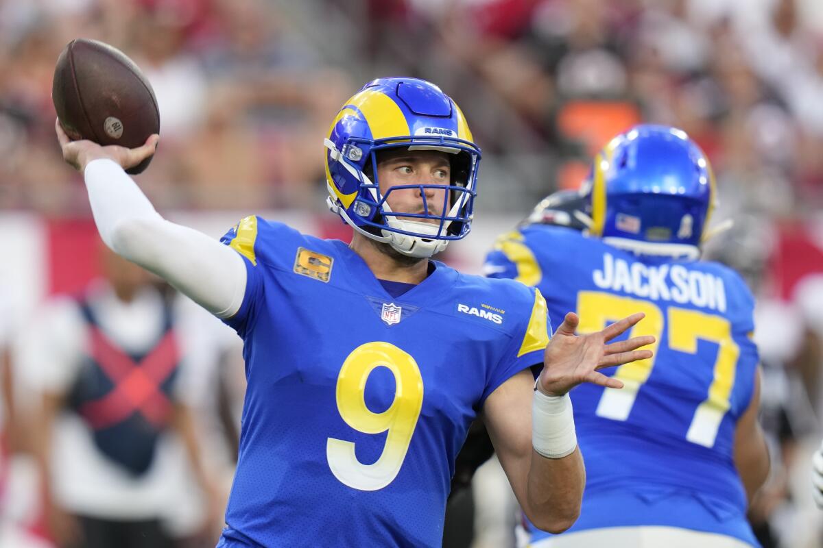 Rams quarterback Matthew Stafford throws a pass from the pocket against the Buccaneers.