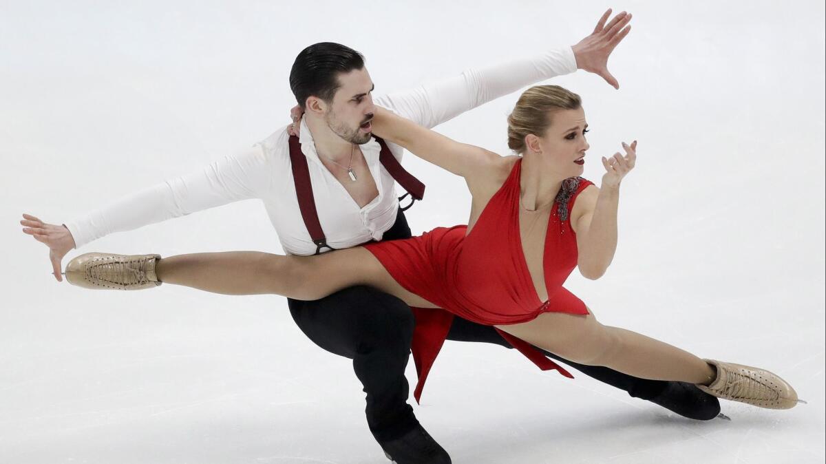 Zachary Donohue and Madison Hubbell of the United States perform Friday during the rhythm dance competition at the Four Continents championships at Honda Center.