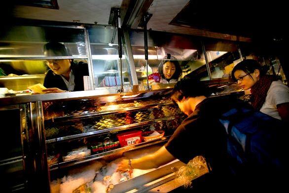 The roving Kogi Korean BBQ truck has gone viral. It's the creation of chef Roy Choi, and it serves small bites of Korean barbecue flavored with strong Mexican accents. The result is that legions of fans track the truck via Twitter.