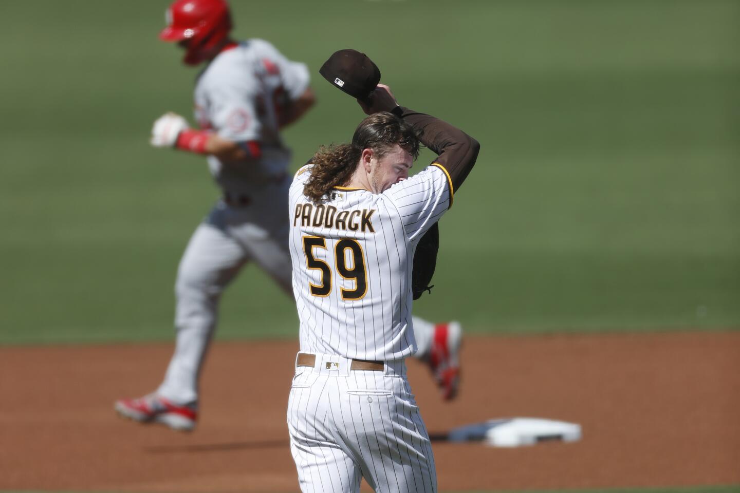 Who has the better hair on the San Diego Padres? Matt Strahm or Chris  Paddack? 