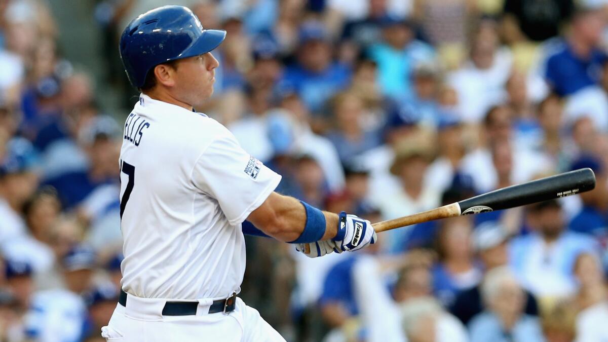 Dodgers catcher A.J. Ellis hits a two-run home run during Game 1 of the National League division series against the St. Louis Cardinals on Oct. 3.