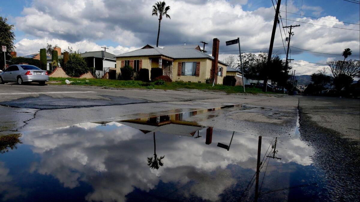 Rainwater collects in 2017 on Klump Avenue in Sun Valley, an area prone to street flooding in stormy weather.