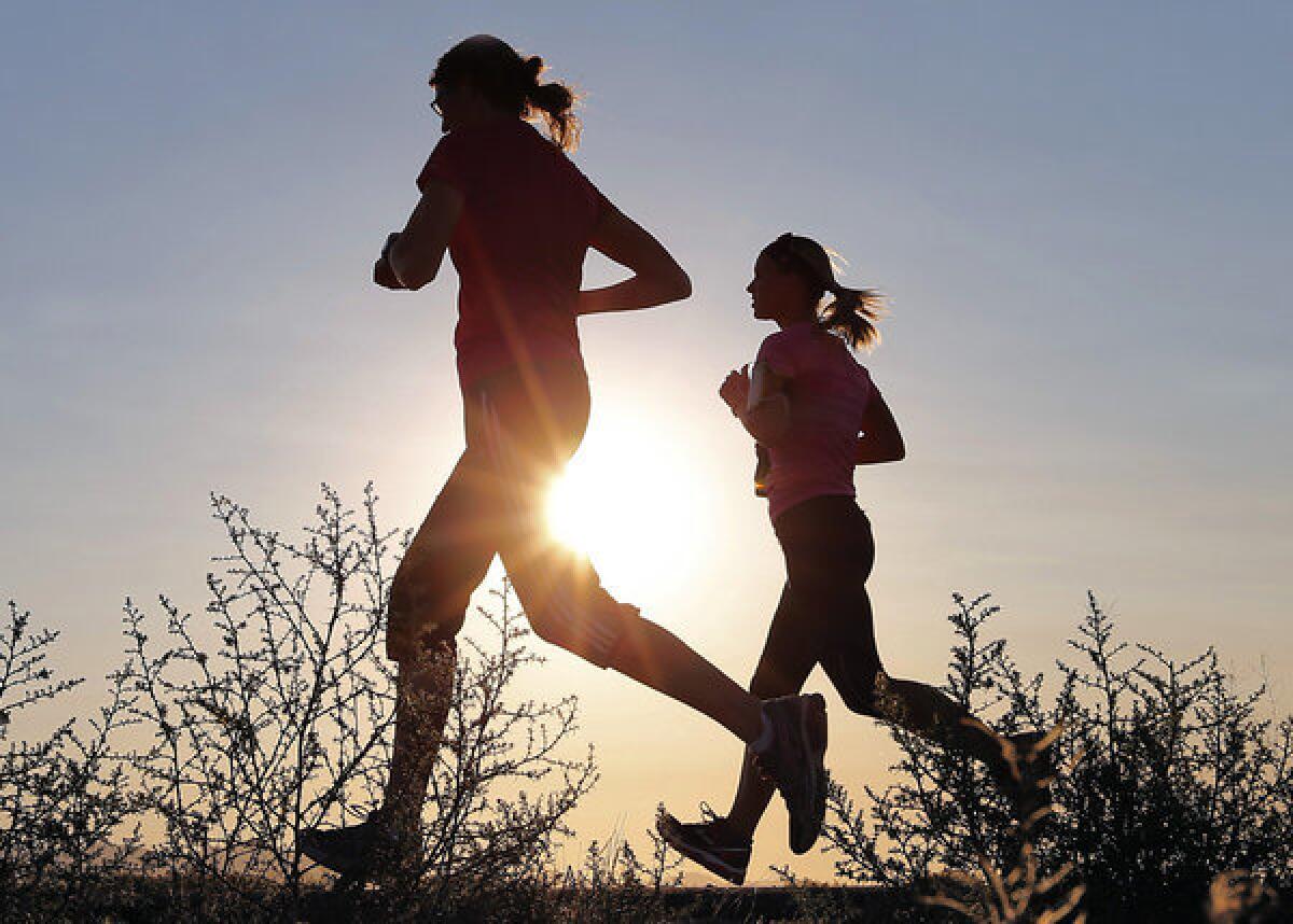 Runners in Mesa, Ariz. Six runners were hospitalized for heat-related conditions at a half marathon in Pasadena on Sunday amid record-breaking temperatures.