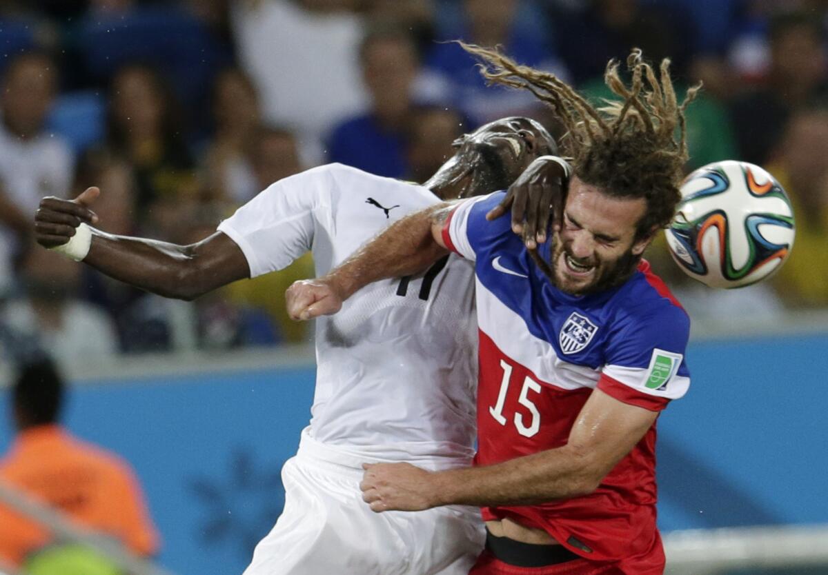 Ghana's Mohammed Rabiu, left, and Kyle Beckerman of the U.S. struggle to head the ball during a World Cup back in June.