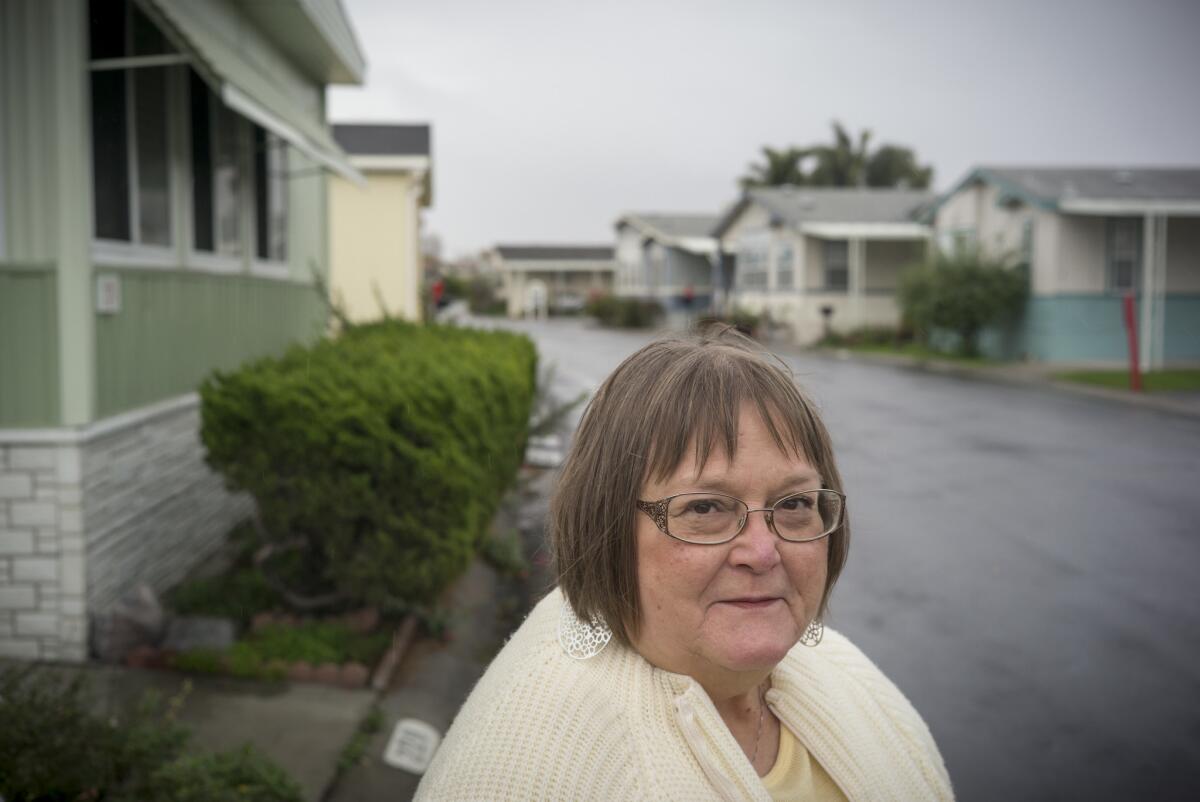 Judy Pavlick outside her mobile home in the Plaza del Rey mobile home park. She is leading a rent control campaign in Sunnyvale, Calif.