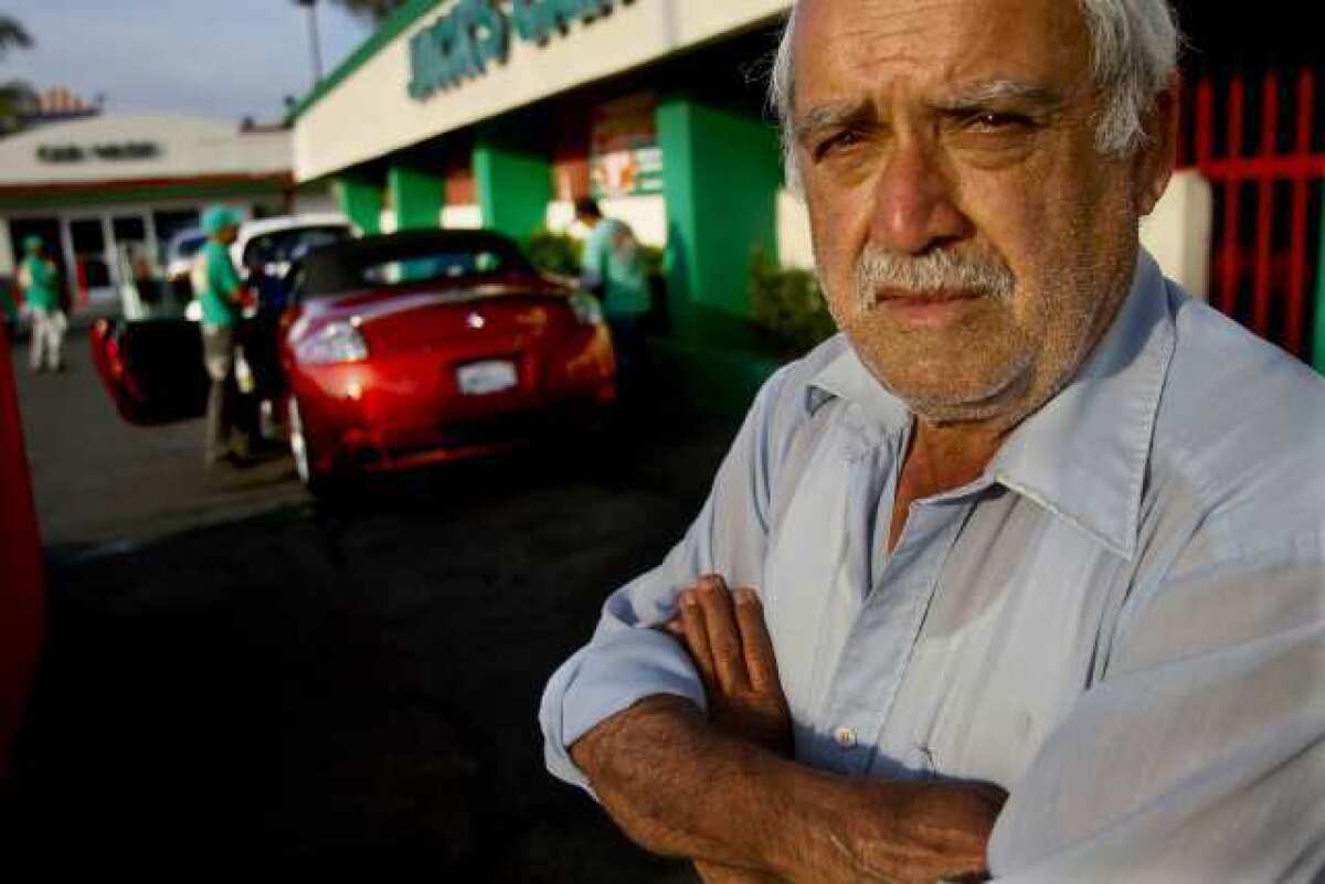 Albert Neesan and his son have run the carwash since 1986. The lease gave them first right to buy the land, but a high price put it out of their reach.