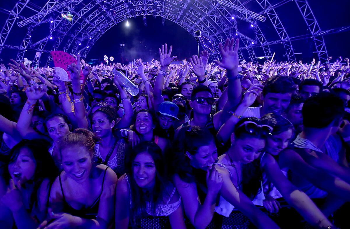Fans of Zedd, the producer and DJ, vibrate to his performance at the Coachella Valley Music and Arts Festival in Indio on Friday.