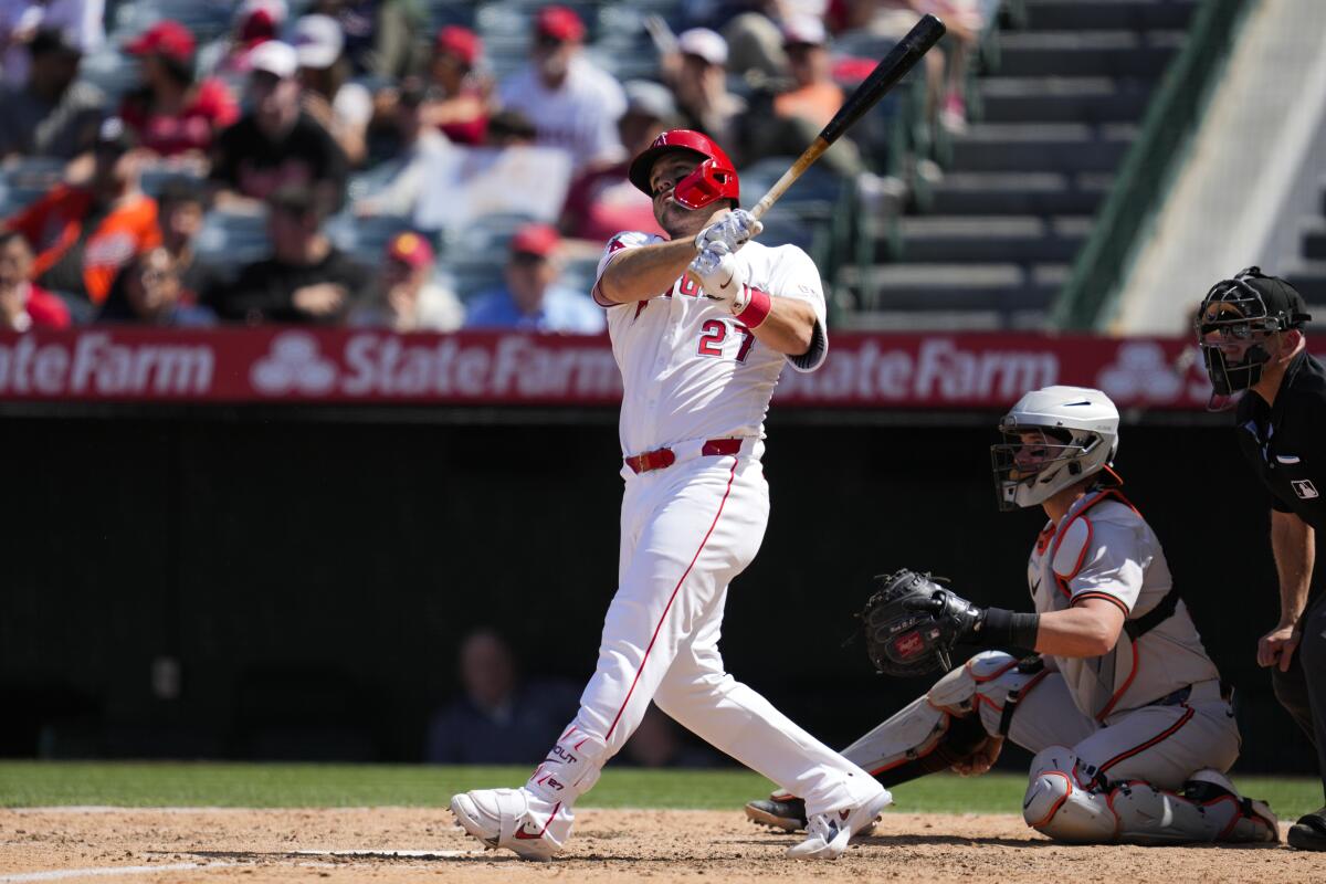 Mike Trout hits a home run during the sixth inning.