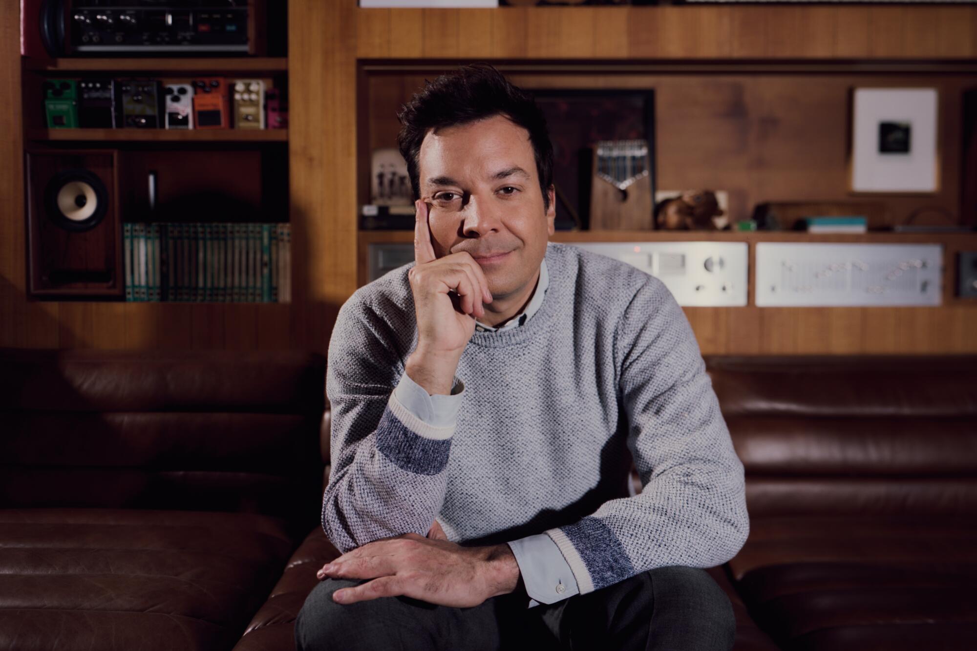 Jimmy Fallon sits in his office for a portrait.