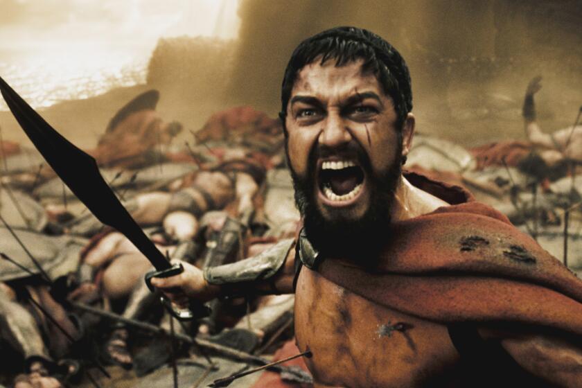 ET.0207.300movie.14 –– A wounded Leonidas (GERARD BUTLER) roars his defiance at the Persian invaders in Warner Bros. Pictures', Legendary Pictures' and Virtual Studios' action drama "300," distributed by Warner Bros. Pictures.