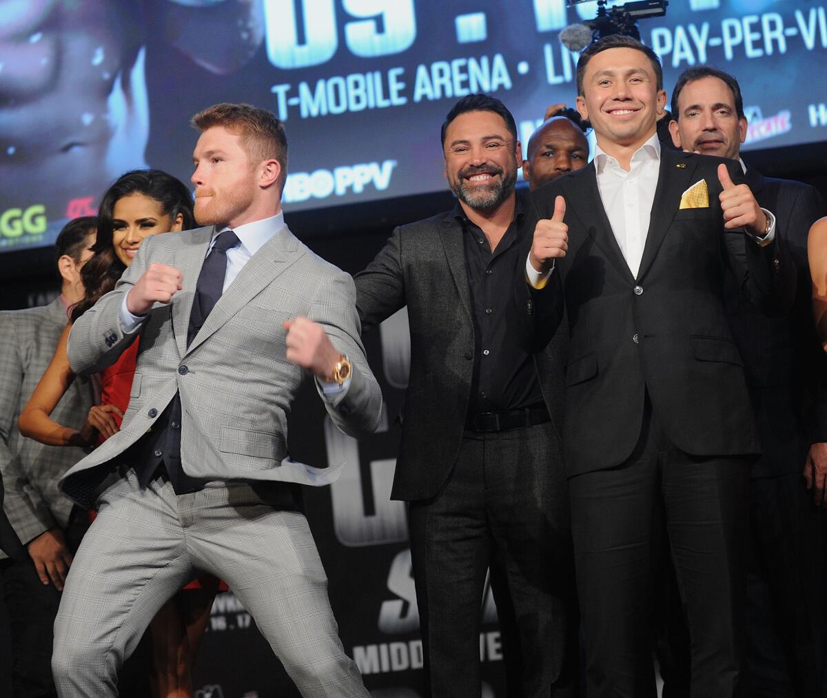 NEW YORK, NY - JUNE 20: (L-R) Lineal & RING Magazine Middleweight World Champ Canelo Alvarez, Oscar De La Hoya and Gennadi Golovkin attend the Canelo Alvarez and Gennady Golovkin Press Tour at The Theater at Madison Square Garden on June 20, 2017 in New York City. *