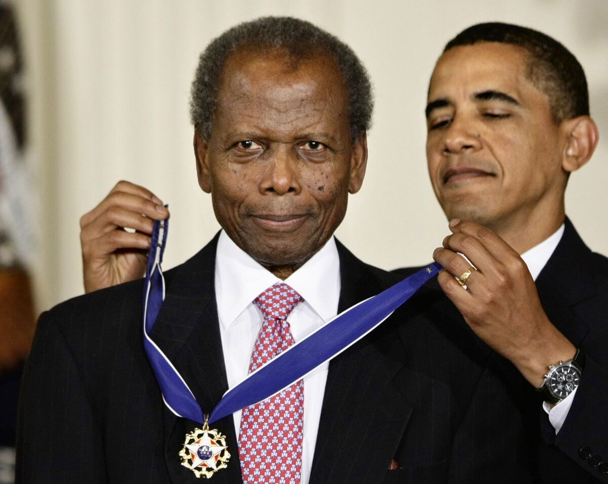 President Barack Obama with Sidney Poitier in Aug. 12, 2009. 