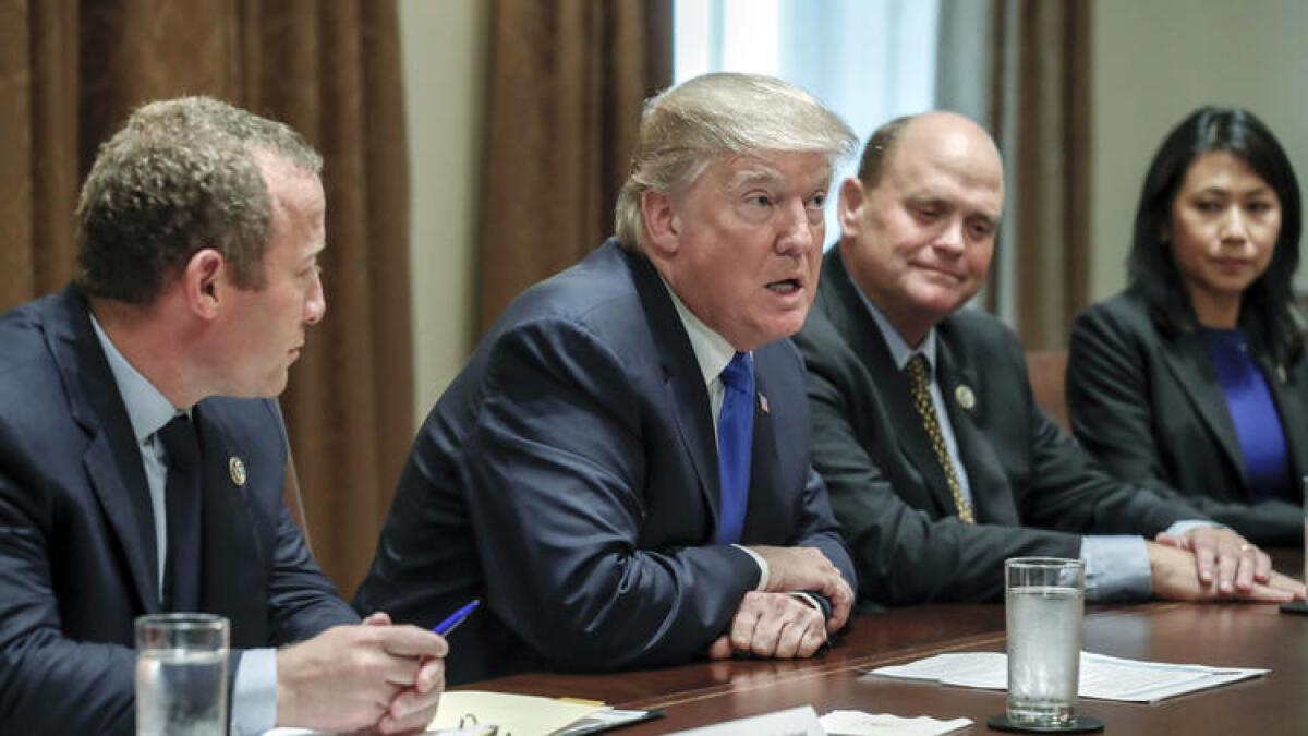 President Trump meets at the White House with a bipartisan group of lawmakers about tax reform.