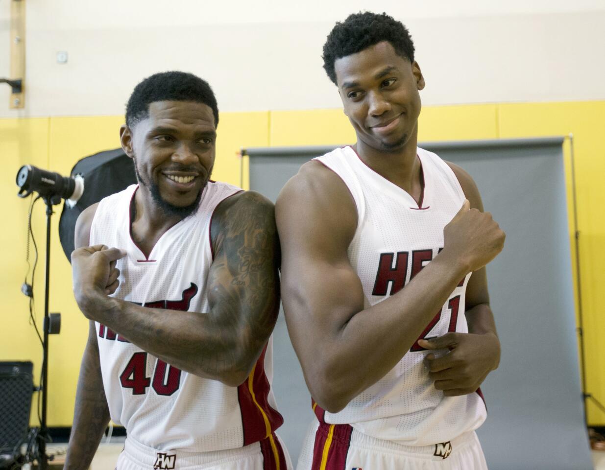 Miami Heat players Udonis Haslem (40), left, and Hassan Whiteside pose during the Miami Heat media day, Monday, Sept. 26, 2016, in Miami, Fla. (AP Photo/Wilfredo Lee)