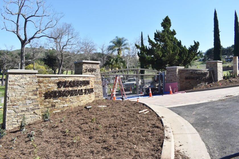 The nearly-complete new main entrance for Dearborn Memorial Park in Poway. Workers were putting in final touches on Monday.