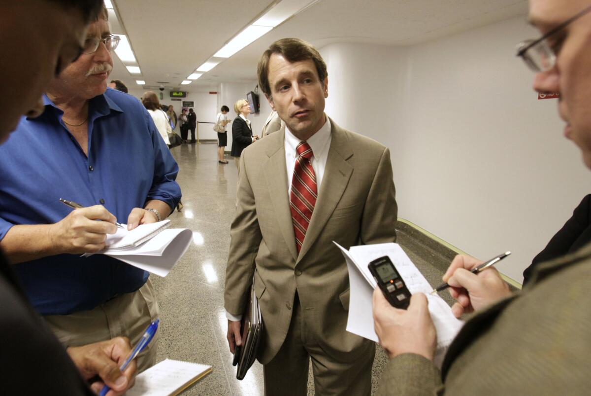 California Insurance Commissioner Dave Jones, second from right, has filed papers saying he intends to run for state attorney general in 2018.