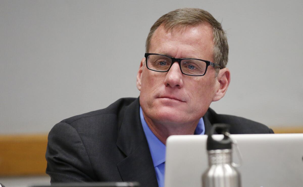 California Coastal Commissioner Erik Howell listens to speakers at a commission hearing in February when the panel decided to dismiss the agency's executive director, Charles Lester.