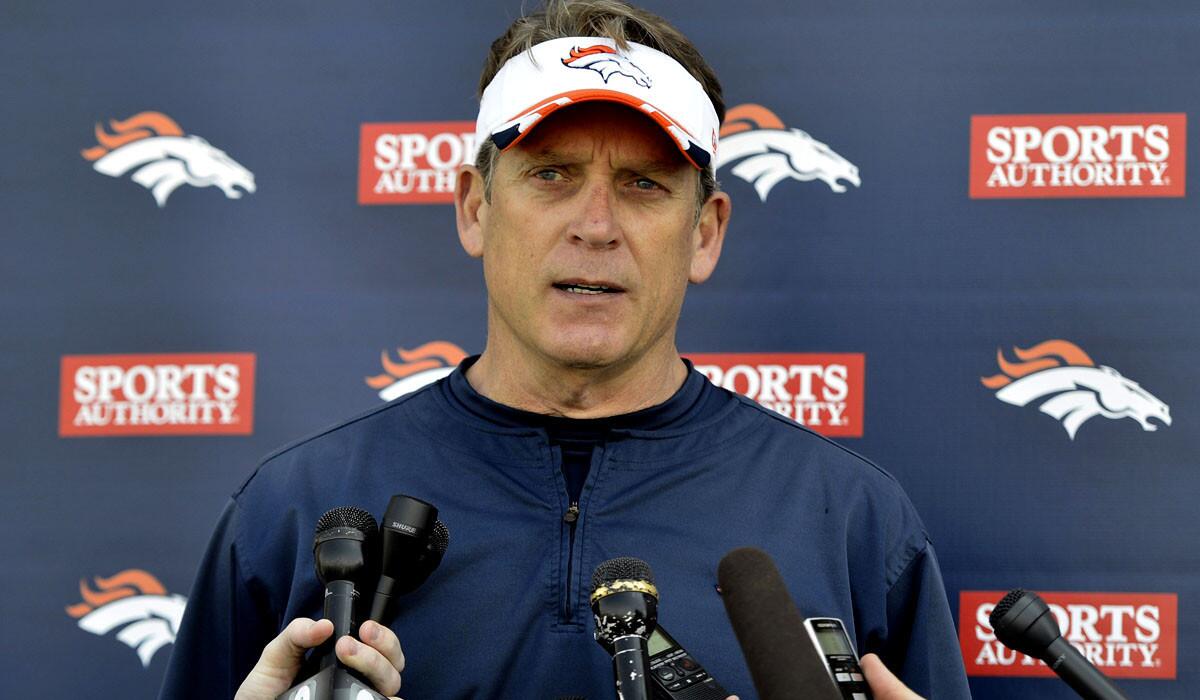 Broncos defensive coordinator Jack Del Rio talks to reporters following a rookie camp last spring.