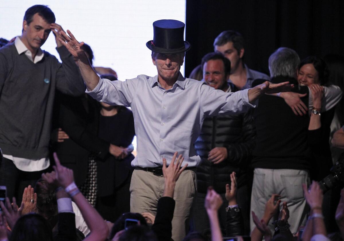 Argentine presidential candidate Mauricio Macri celebrates at the party's headquarters in Buenos Aires on Oct. 25.