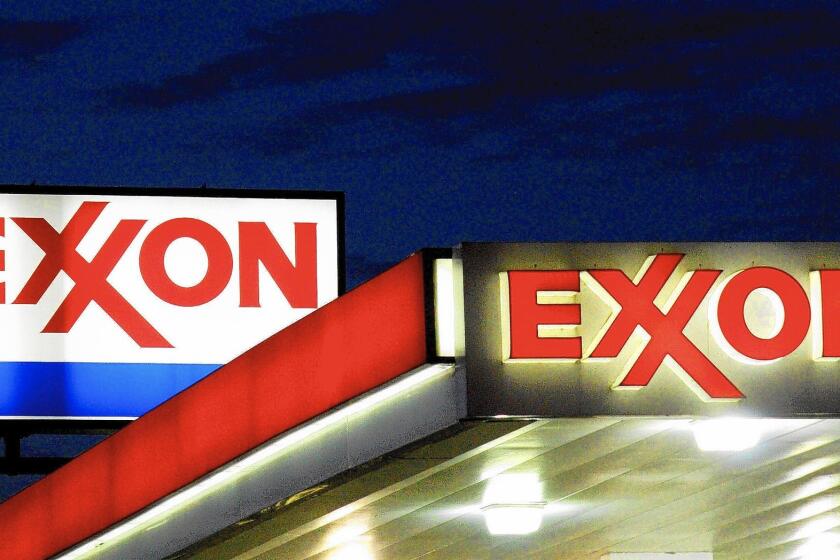 An international arbitration panel has awarded Exxon Mobil $1.6 billion for its seized Venezuelan assets. Above, an Exxon gas station in Manassas, Va.