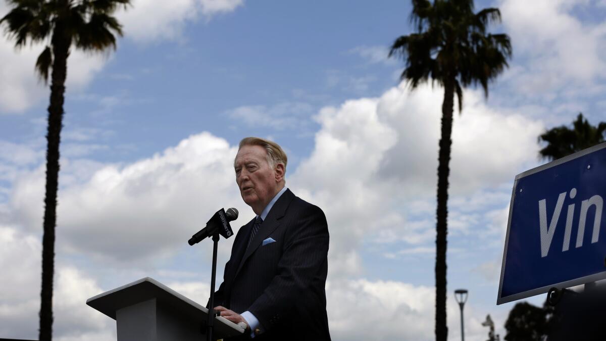 Vin Scully speaks during a ceremony announcing the renaming of a street leading to Dodger Stadium in his honor on April 11, 2016.