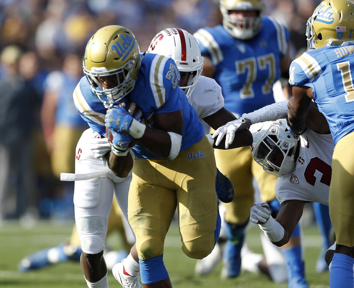 UCLA running back Joshua Kelley breaks through for a touchdown against Stanford in the second quarter.