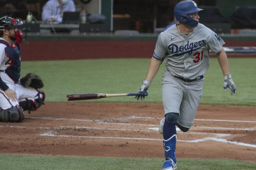 Arlington, Texas, Wednesday, October 14, 2020. Los Angeles Dodgers left fielder Joc Pederson (31) homers in the first inning in game three of the NLCS at Globe Life Field. (Robert Gauthier/ Los Angeles Times)