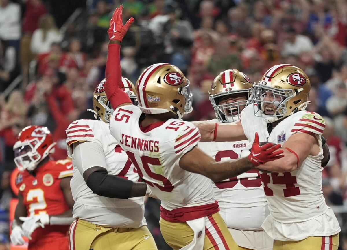 San Francisco 49ers receiver Jauan Jennings (15) celebrates his touchdown catch against the Kansas City Chiefs.
