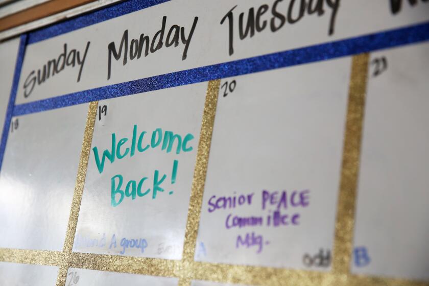 LOS ANGELES, CA - APRIL 21: "Welcome Back," is written on a calendar in Andrea Glenn's class at Millikan High School where seniors have been allowed back in class and other classes will be invited back on Monday in Long Beach on Wednesday, April 21, 2021 in Los Angeles, CA. Lesson plans are designed around a hybrid of zoom and in-class students. (Dania Maxwell / Los Angeles Times)
