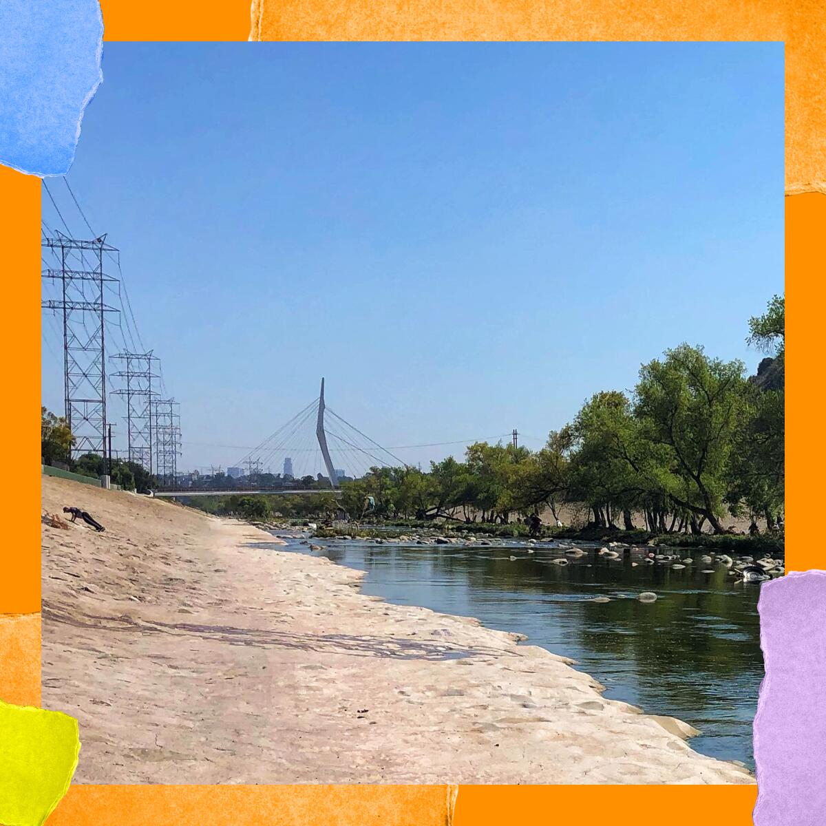 A dirt bank alongside a narrow river; in the background are power lines and a city skyline.