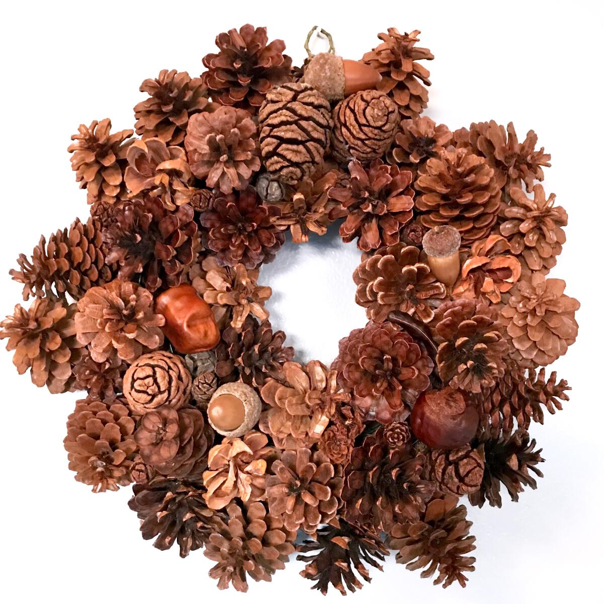 A pine-cone wreath by Kathy Castaneda of Santa Barbara Botanic Garden.