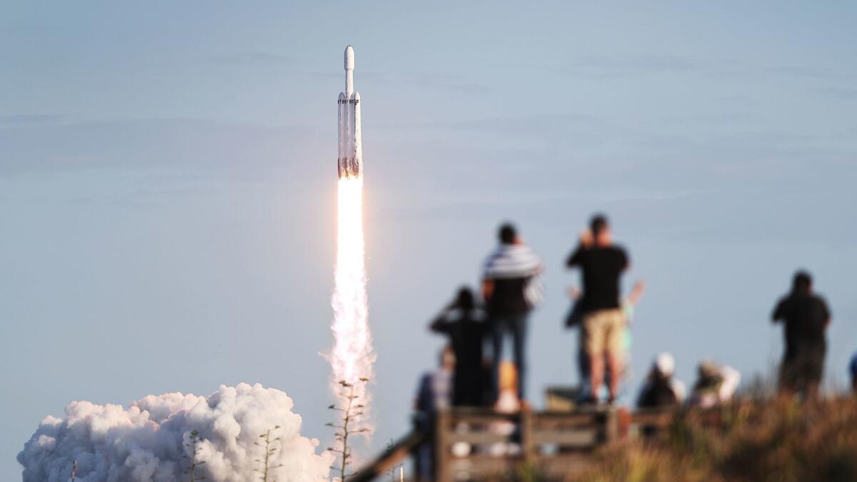 A SpaceX Falcon Heavy rocket lifts off from NASA's Kennedy Space Center in Florida on April 11.
