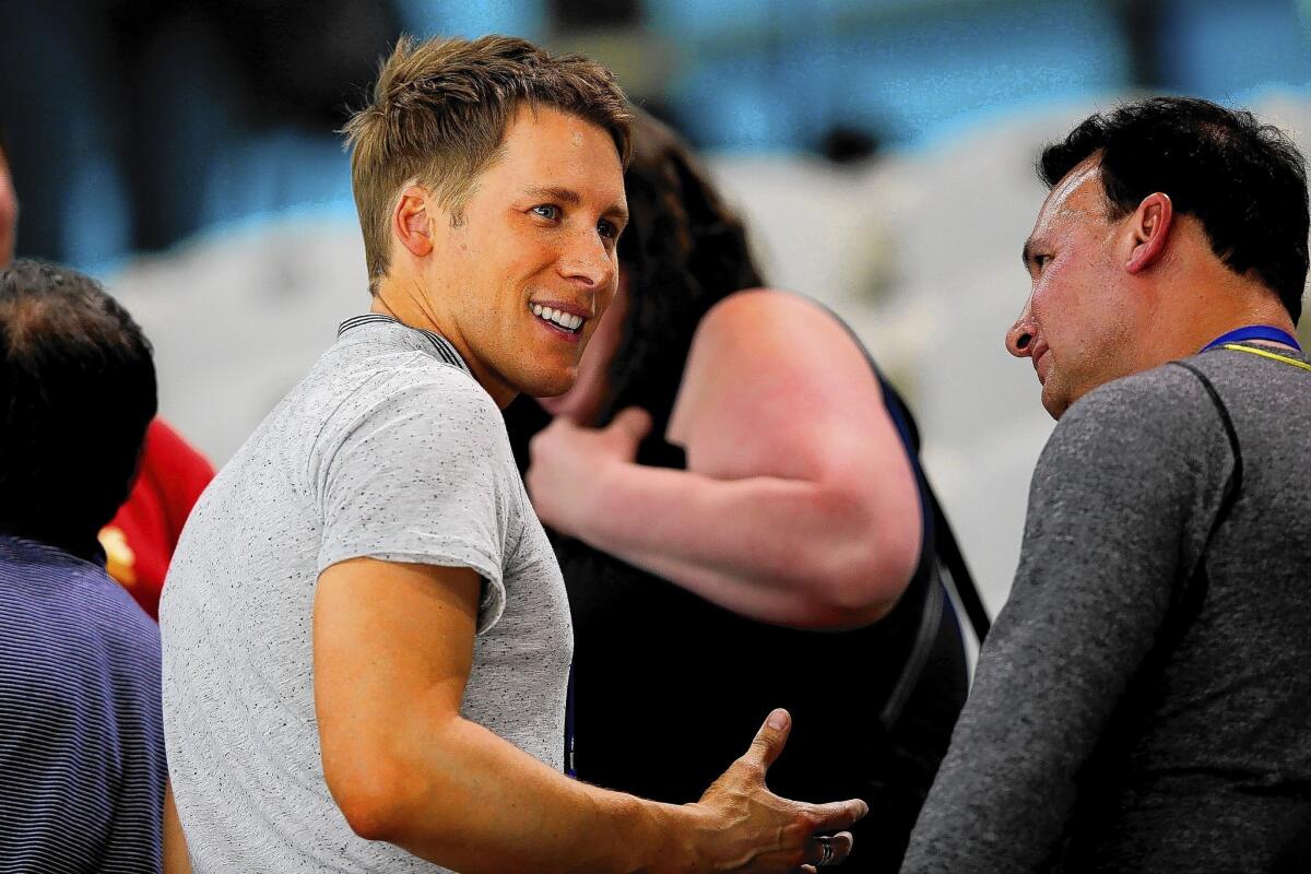 Dustin Lance Black at the Diving World Series in London last weekend; after disinviting Black to be commencement speaker, a chastened Pasadena City College board voted Wednesday to re-invite him.