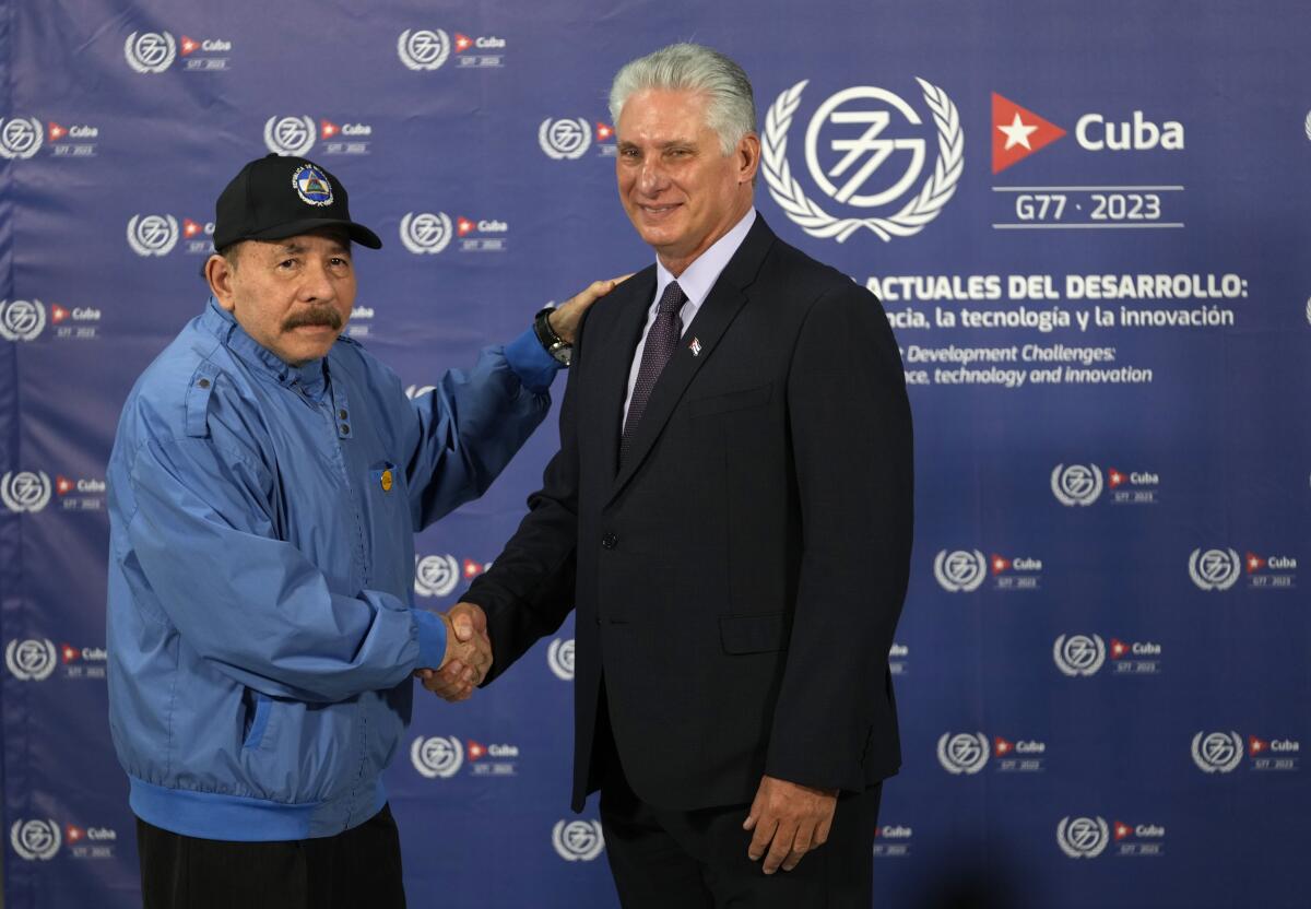 Nicaraguan President Daniel Ortega shaking hands with Cuban President Miguel Diaz-Canel